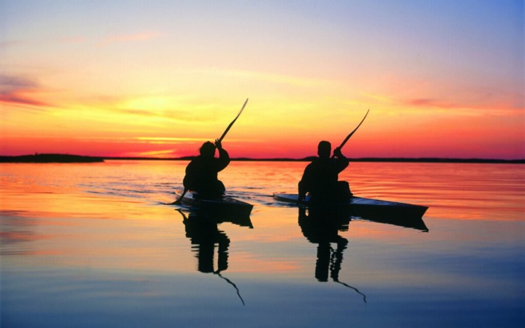 Kayakers paddling at Fisherman's Cove Waterfront Resort near Tampa Bay Florida